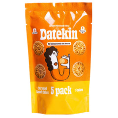Orange packaging of Datekin caramel snack cakes with a cartoon character on a white background