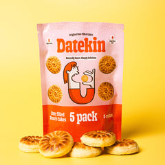Datekin 5-pack Original Date snack cakes packaging with cakes on a yellow background