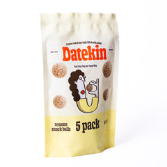Datekin sesame snack balls packaging with cartoon illustration on a white background side view