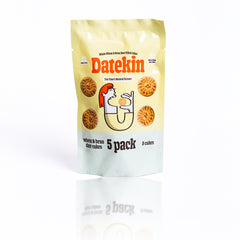 Datekin 5-pack of wheat and bran date cakes packaging on a white background with reflection